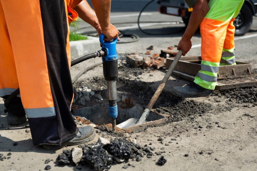 Image showing a clogged drain field, a common issue in septic systems that can lead to slow drainage and unpleasant odors.